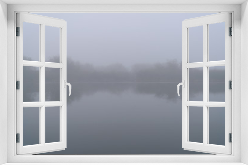 Fototapeta Naklejka Na Ścianę Okno 3D - Mystical Fog in the early morning on a small lake