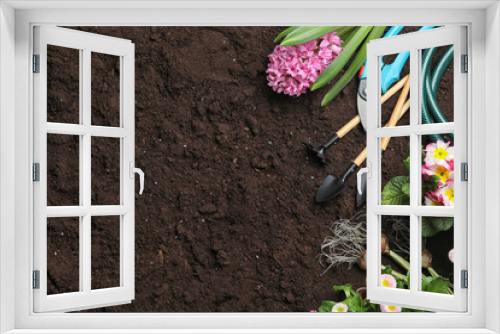 Fototapeta Naklejka Na Ścianę Okno 3D - Flat lay composition with gardening equipment and space for text on ground