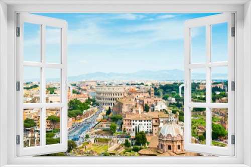 Scenic aerial view. Panorama. Colosseum and Roman Forum in sunny spring day. Rome. Italy