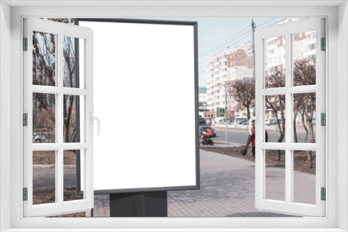 Fototapeta Naklejka Na Ścianę Okno 3D - Vertical small billboard in the city on the sidewalk. Mock up for your advertising or announcements