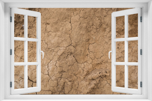 Fototapeta Naklejka Na Ścianę Okno 3D - Texture of dry cracked clay. Red dirt soil background