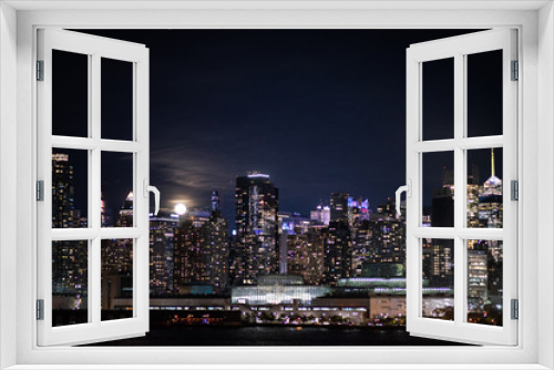 Fototapeta Naklejka Na Ścianę Okno 3D - New York City night skyline Manhattan midtown buildings
