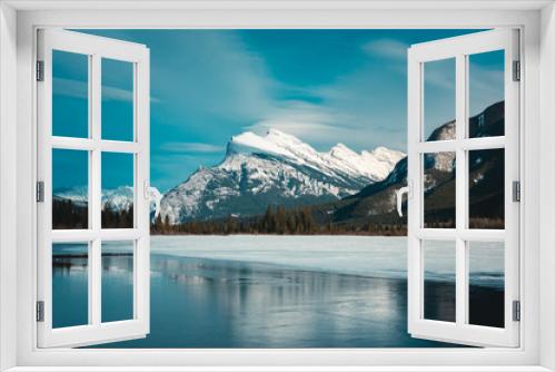 Fototapeta Naklejka Na Ścianę Okno 3D - Panorama of Mount Rundle mountain peak with blue sky reflecting in Vermilion Lakes at Banff national park, Alberta Canada