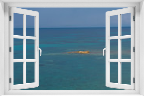 Fototapeta Naklejka Na Ścianę Okno 3D - The Beautiful Turquoise Blue Mediterranean Sea on the Southern Italian Coast