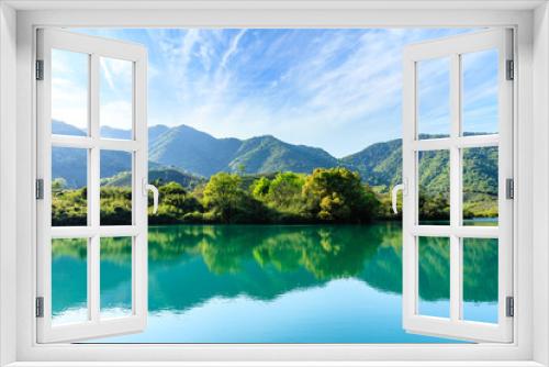 Fototapeta Naklejka Na Ścianę Okno 3D - Beautiful mountains and green reflections