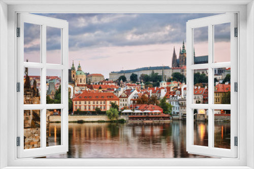 Fototapeta Naklejka Na Ścianę Okno 3D - Evening in Prague. View of Prague Castle, Charles Bridge and the Vltava River Embankment. Czech Republic.