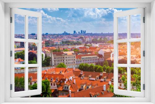 Fototapeta Naklejka Na Ścianę Okno 3D - Prague red roofs and dozen spires of historical Old Town of Prague. Cityscape of Prague on a sunny day. Red rooftops, spires and the Charles Bridge and Vltava River in the background. Prague, Czechia.