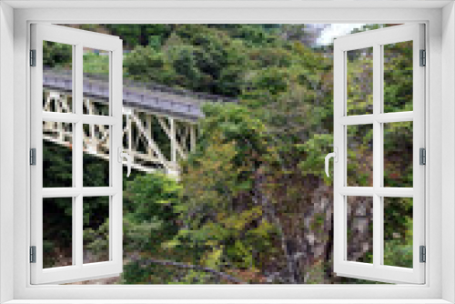 Fototapeta Naklejka Na Ścianę Okno 3D - The overpass which hangs over the ravine - Nariaibashi brigde,Nariaikyo valley,Hirosegawa river,