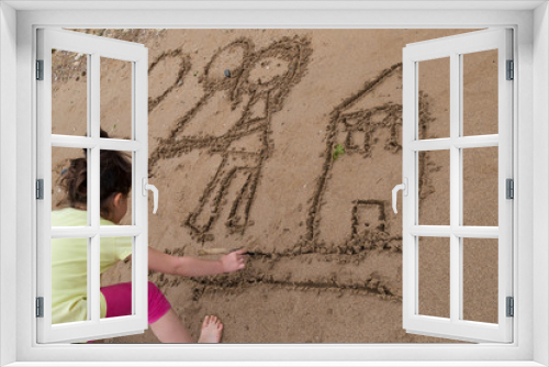 Fototapeta Naklejka Na Ścianę Okno 3D - the child draw house picture on the sand at the beach by the sea in the summer for holiday concept.