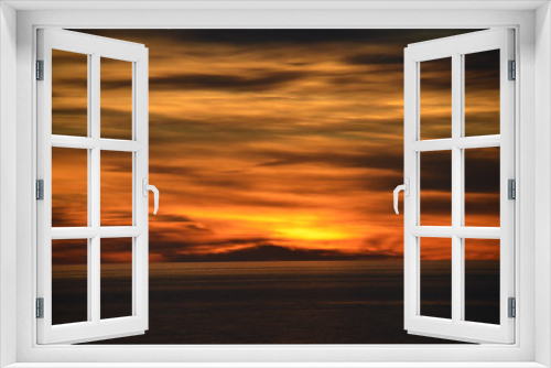 Fototapeta Naklejka Na Ścianę Okno 3D - Sunset with extraordinary clouds and orange and gray colours off Glenelg South Australia 