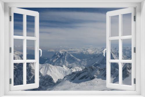 Fototapeta Naklejka Na Ścianę Okno 3D - Verschneite Berggipfel um die Zugspitze mit bluen Himmel und Wolken