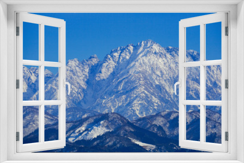 Fototapeta Naklejka Na Ścianę Okno 3D - Tateyama Mountain Range seen from Toyama Plain in Japan.  Mt, turugidake.　富山平野から見た立山連峰　剱岳