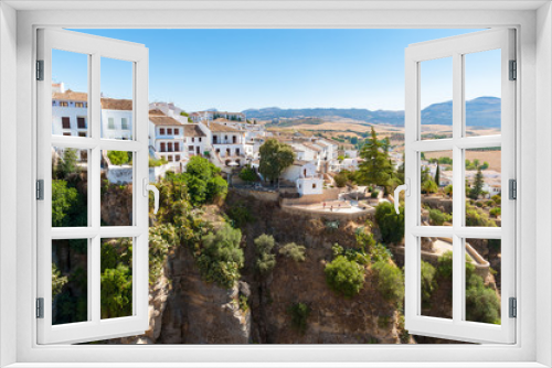 Fototapeta Naklejka Na Ścianę Okno 3D - Houses on the edge of canyon in Ronda, Andalusia, Spain