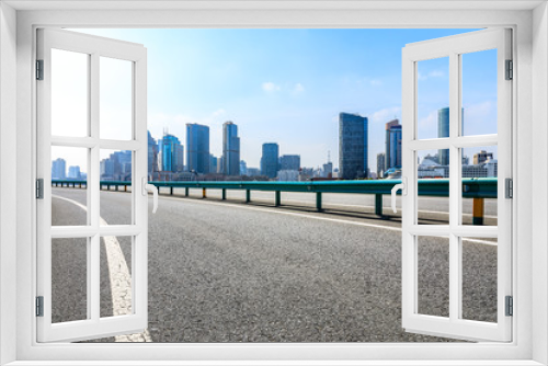 Fototapeta Naklejka Na Ścianę Okno 3D - Empty highway and modern city skyline in Shanghai