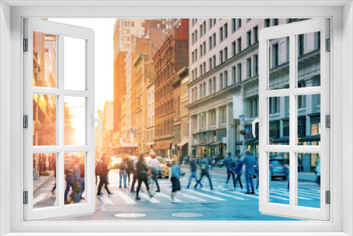 Fototapeta Naklejka Na Ścianę Okno 3D - Crowds of people walking across the busy intersection of 23rd Street and 5th Avenue in Midtown Manhattan, New York City