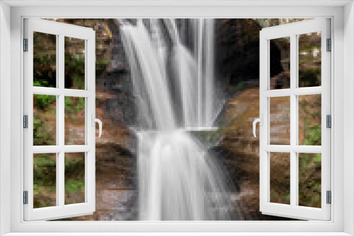 Fototapeta Naklejka Na Ścianę Okno 3D - Waterfall at Old Mans Cave - The Old Man’s Cave area of Ohio’s Hocking Hills State Park has several beautiful waterfalls including the Upper Falls at the beginning of an amazing sandstone gorge.