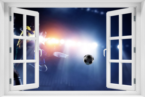 Fototapeta Naklejka Na Ścianę Okno 3D - Soccer players on stadium in action. Mixed media