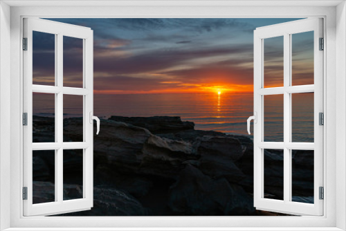 Fototapeta Naklejka Na Ścianę Okno 3D - Bright colorful sunset on ocean