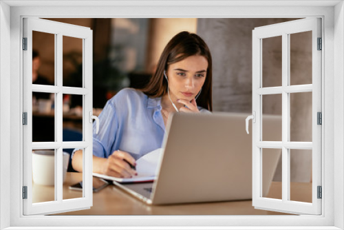 Businesswoman in having a video call on laptop.