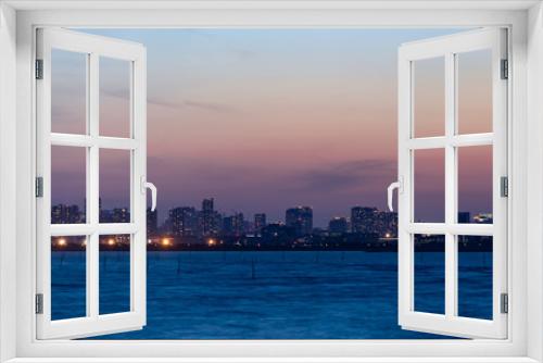 Fototapeta Naklejka Na Ścianę Okno 3D - 千葉から見た東京湾越しのビル群と夕暮れ