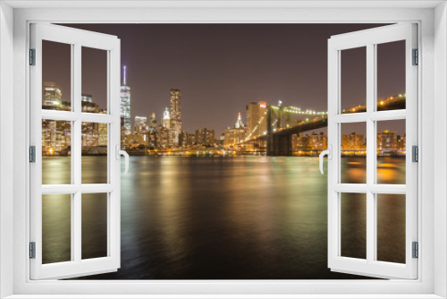 Fototapeta Naklejka Na Ścianę Okno 3D - New york skyline during night from river