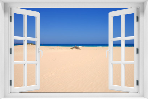 Fototapeta Naklejka Na Ścianę Okno 3D - Sand Dunes and beach in National Park Corralejo, Fuerteventura.