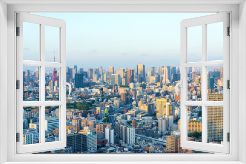 Fototapeta Naklejka Na Ścianę Okno 3D - 高層ビルから眺める日没前の東京の風景
