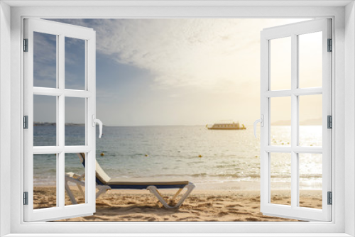 Fototapeta Naklejka Na Ścianę Okno 3D - lateral view of a lounger on the beach of Red Sea coast