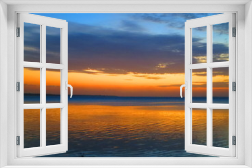 Fototapeta Naklejka Na Ścianę Okno 3D - Atardecer en el mar