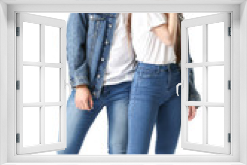 Stylish young couple in jeans clothes on white background