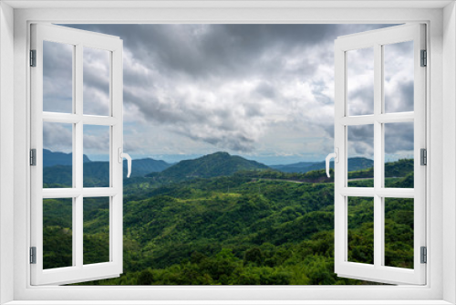 Blue sky high peak mountains fog hills mist scenery national park views at Phu Tub Berk, Khao Koh, Phetchabun Province, Thailand