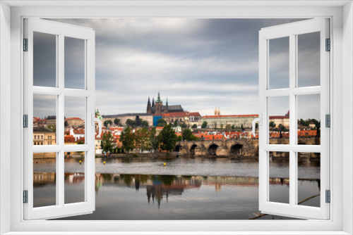 Fototapeta Naklejka Na Ścianę Okno 3D - Beautiful Vltava river in Prague with old town and historical buildings in the background