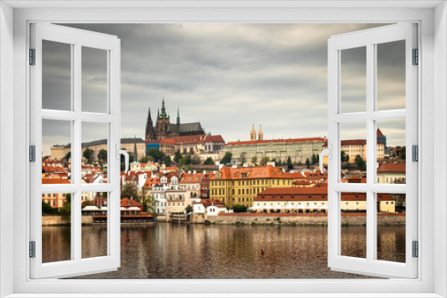 Fototapeta Naklejka Na Ścianę Okno 3D - Beautiful Vltava river in Prague with old town and historical buildings in the background