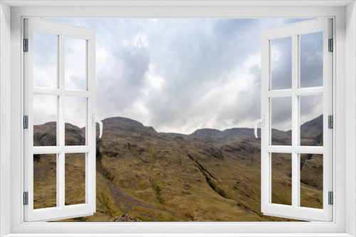 Fototapeta Naklejka Na Ścianę Okno 3D - View of Lingmell and Scafell Pike with Dramatic Grey Clouds, Lake District, England, UK