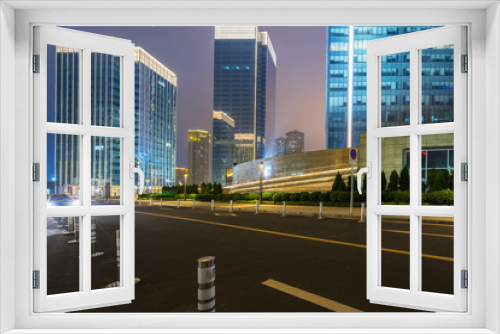 Fototapeta Naklejka Na Ścianę Okno 3D - Office buildings and highways at night in the financial center, chongqing, China