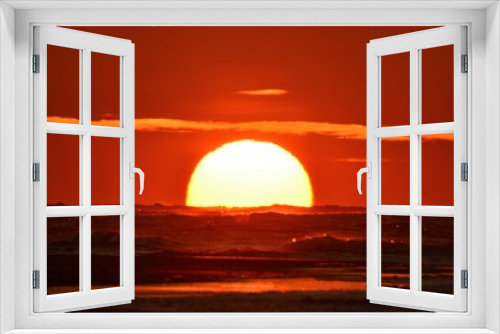 Fototapeta Naklejka Na Ścianę Okno 3D - sunset over a wild sea
