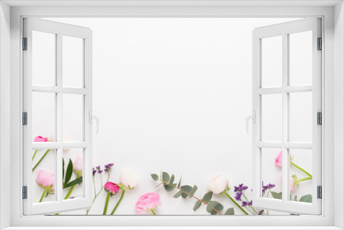 Fototapeta Naklejka Na Ścianę Okno 3D - Beautiful colored ranunculus flowers on a white background.Spring greeting card.