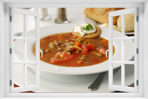 Fototapeta Naklejka Na Ścianę Okno 3D - Hearty bowl of vegetable beef soup