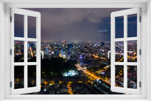 Fototapeta Naklejka Na Ścianę Okno 3D - Landscape at Ho Chi Minh city at night - at Viet nam  by drone 