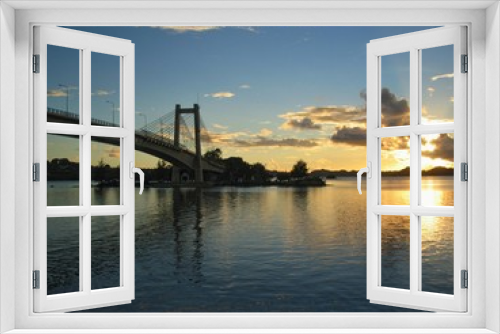 Fototapeta Naklejka Na Ścianę Okno 3D - Sunset over the Japan-Palau Friendship Bridge spanning Korror and Airai States in Palau. 