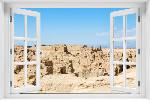 Fototapeta Naklejka Na Ścianę Okno 3D - Jiaohe Ruins seen from above, Turpan, China. Ancient capital of the Jushi kingdom, it was a natural fortress atop a steep cliff leaf-shaped plateau between two river valleys, more than 2000 years old