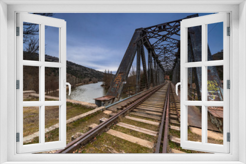 Fototapeta Naklejka Na Ścianę Okno 3D - iron bridge over the river