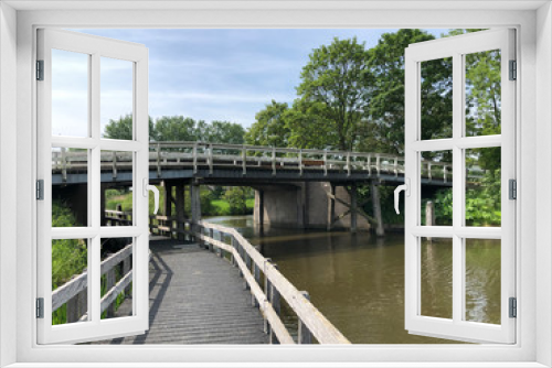 Fototapeta Naklejka Na Ścianę Okno 3D - Bridge over a canal around Weidum