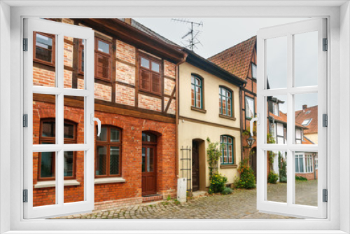 Fototapeta Naklejka Na Ścianę Okno 3D - Street with Medieval old brick buildings. Luneburg. Germany