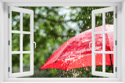 Fototapeta Naklejka Na Ścianę Okno 3D - Red umbrella outdoors on rainy day