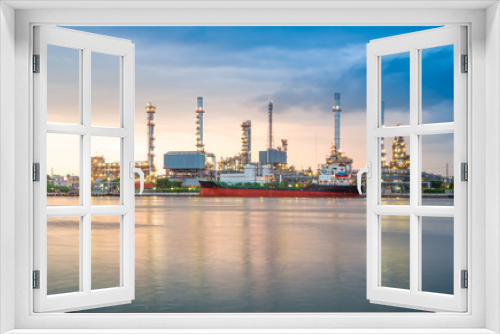 Fototapeta Naklejka Na Ścianę Okno 3D - Oil refinery or petrochemical industry with ship in thailand. for Logistic Import Export background,Chao Phraya river, Thailand