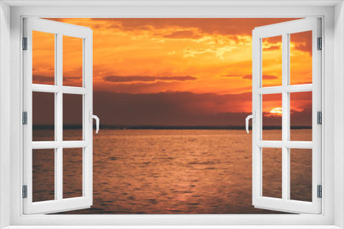 Fototapeta Naklejka Na Ścianę Okno 3D - Beautiful panoramic view of  ocean tranquil at sunset,Two boats are stationary.copy space For text.