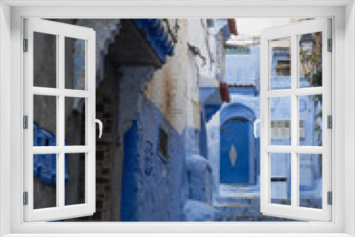 Fototapeta Naklejka Na Ścianę Okno 3D - The blue doors of Chefchaouen, Morocco with their unique style