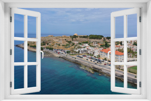 Fototapeta Naklejka Na Ścianę Okno 3D - Aerial drone photo of unique old picturesque Venetian port with old lighthouse in the heart of famous city of Rethymno, Crete island, Greece