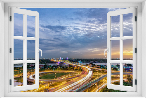 Fototapeta Naklejka Na Ścianę Okno 3D - The opening of the light to decorate the bridge across the Chao Phraya River in Thailand, LED lighted bridge, traffic on the bridge over the river